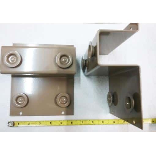 Heavy-duty metal mounting brackets with rubber insulators for industrial or electronic equipment installation. Compatible with various mounting surfaces for secure and stable setup.