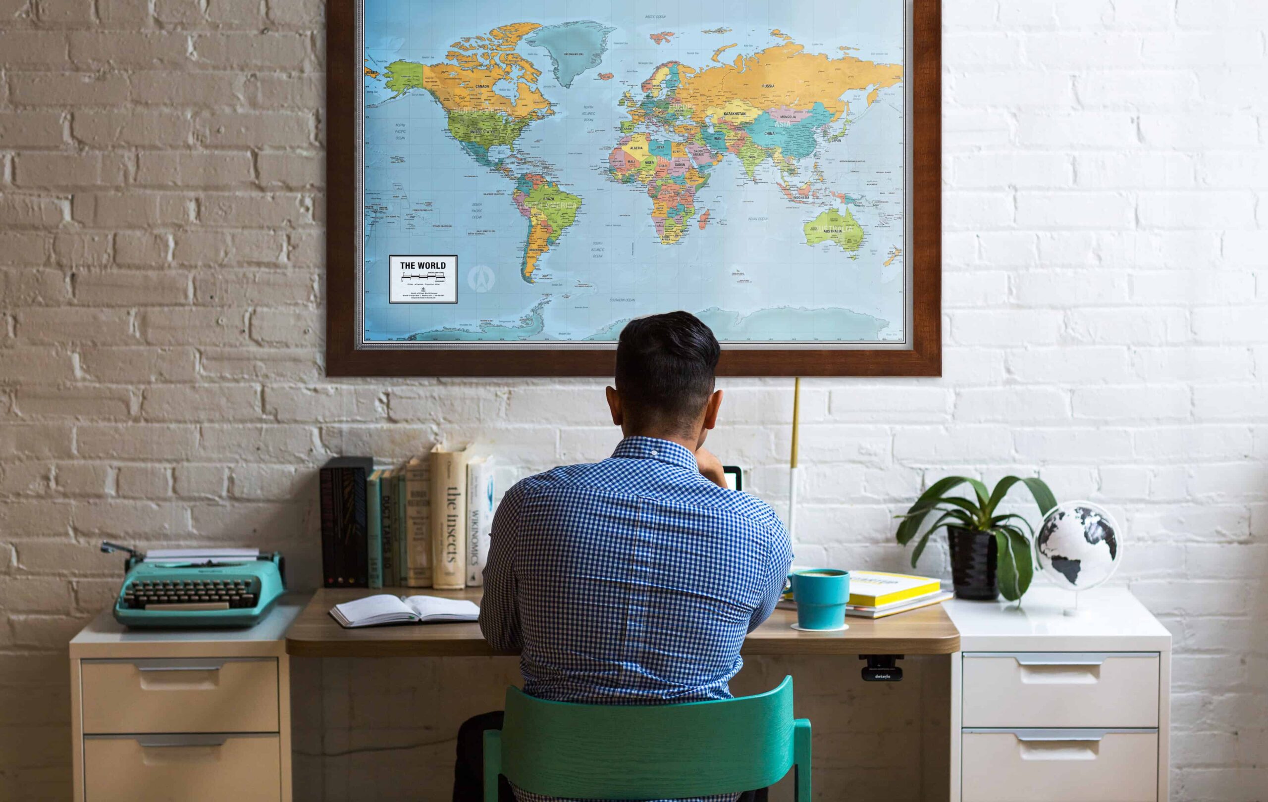 Detailed world map display for geographic exploration and travel planning at The Map Shop.
